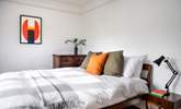 Cosy up under the duvet in the king-size bed in the third bedroom. - Thumbnail Image