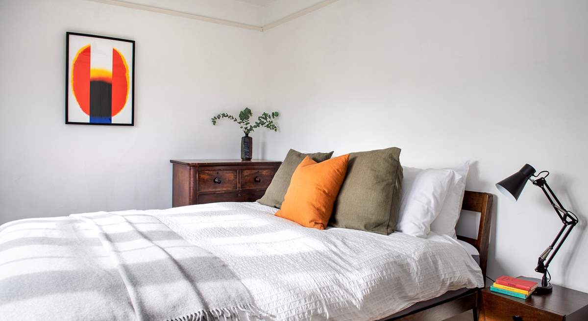 Cosy up under the duvet in the king-size bed in the third bedroom.