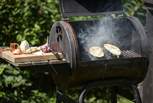 Cook al fresco over the rustic barbecue!