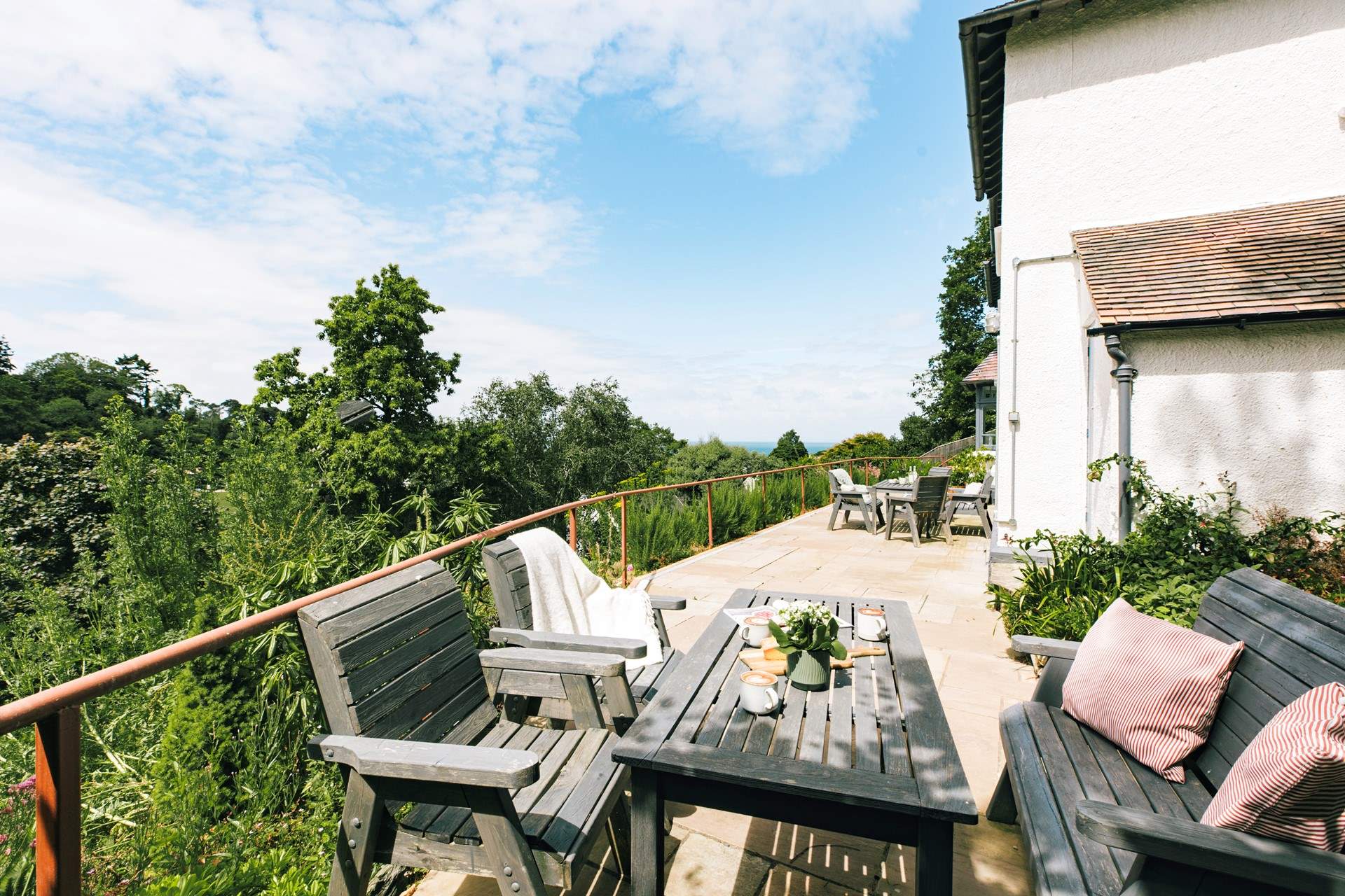 The terrace stretches out across the breadth of the house.