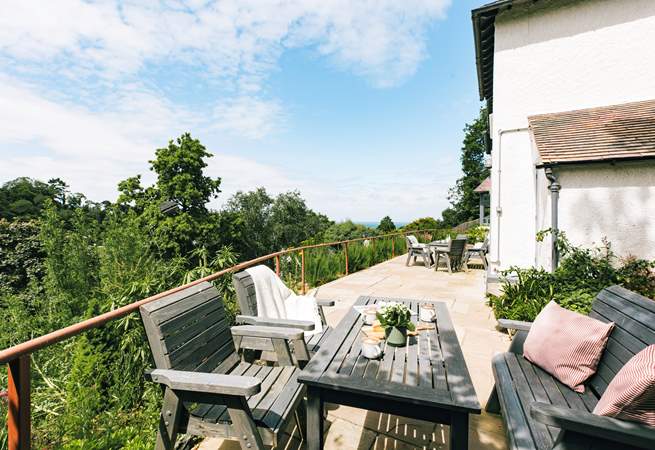 The terrace stretches out across the breadth of the house.