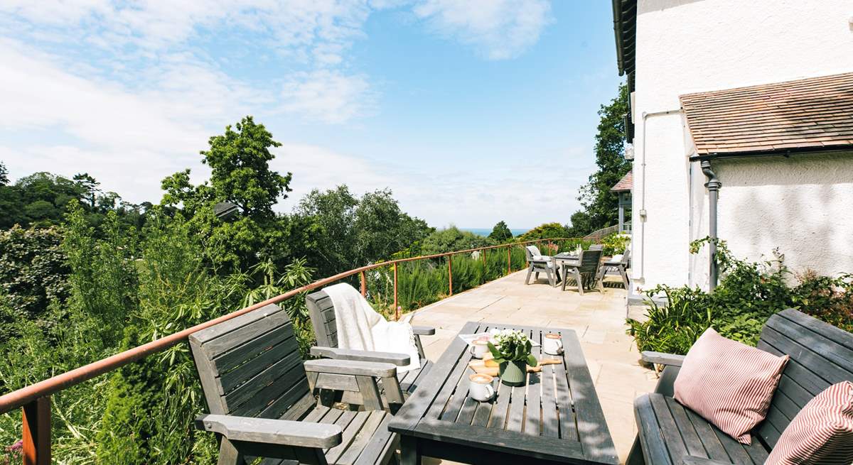 The terrace stretches out across the breadth of the house.