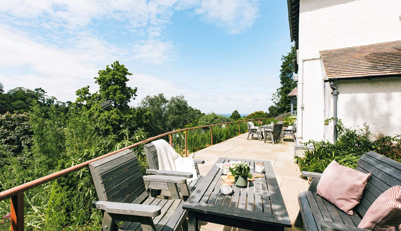 The terrace stretches out across the breadth of the house.