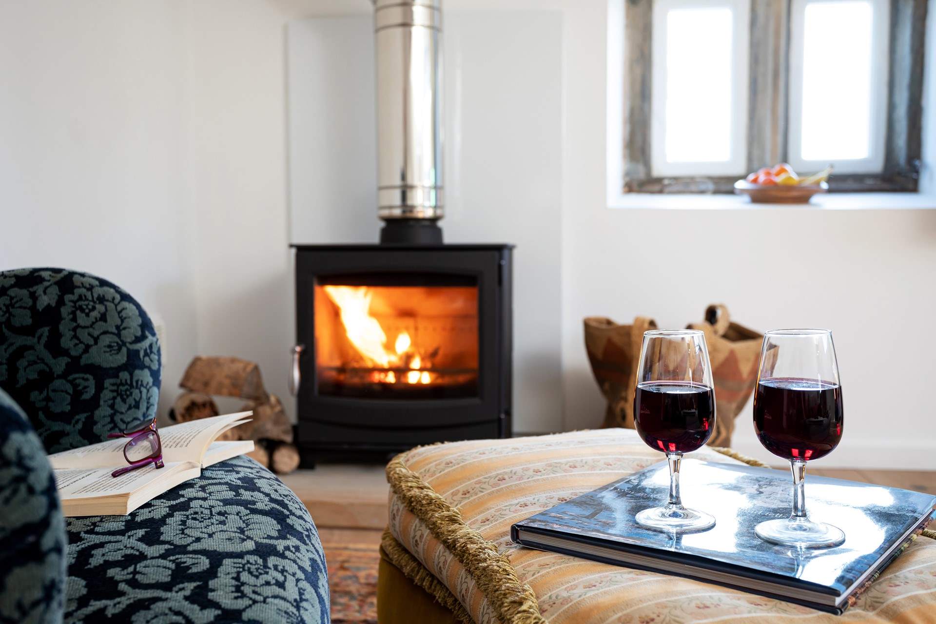 Cosy up in front of the fire.