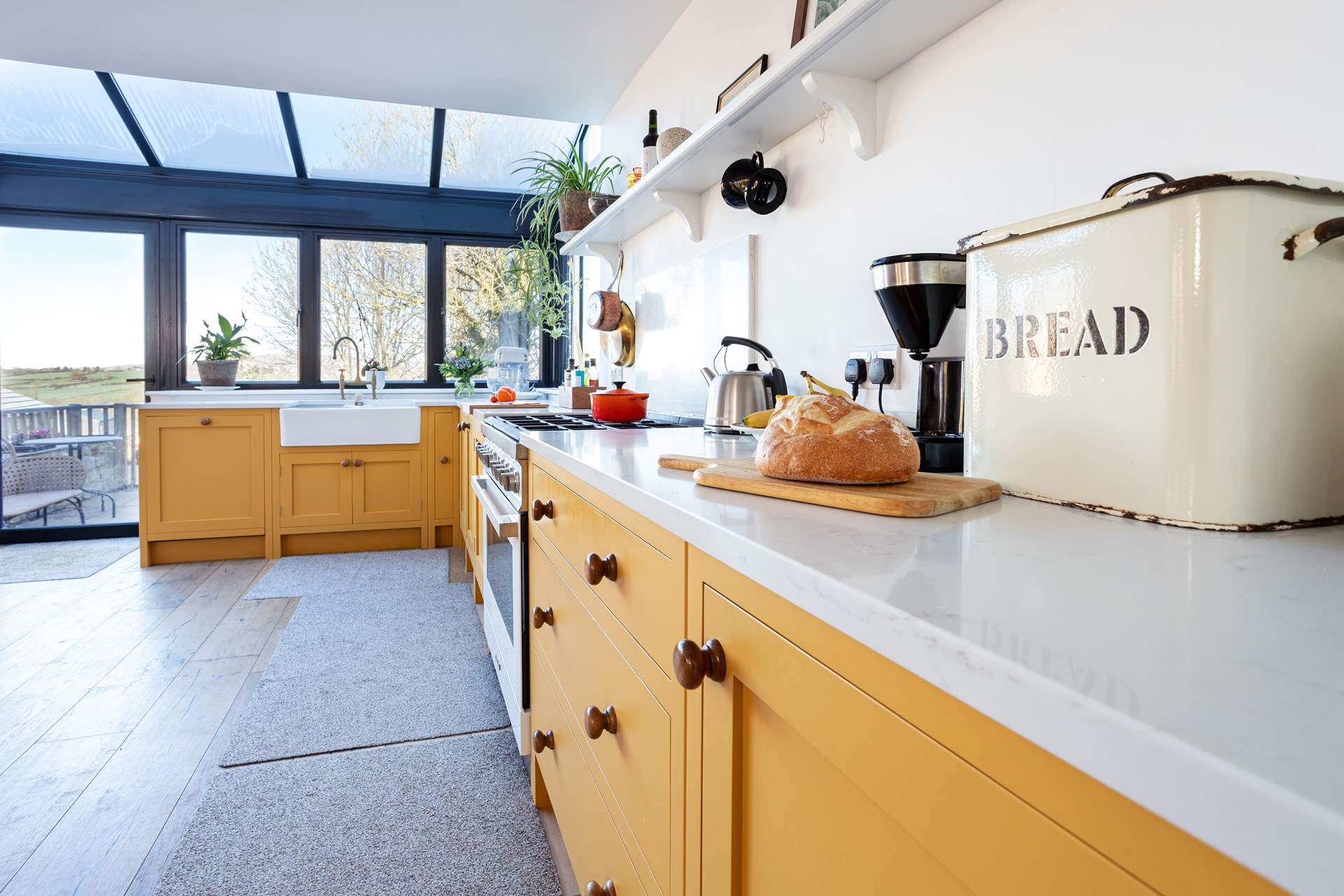 Light streams in as you make your breakfast.