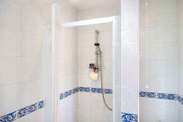 An en suite shower-room awaits in the second bedroom