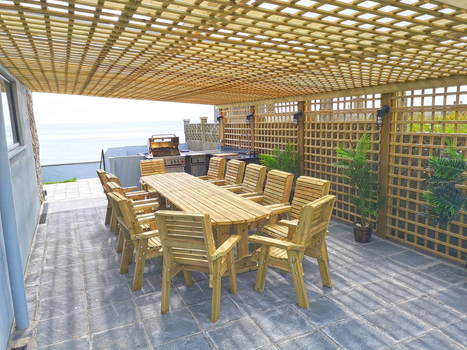 The dining terrace is the place for all to gather for alfresco dining.