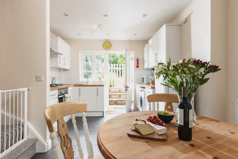 The bright kitchen-area is a delightful space for breakfast or dinner.
