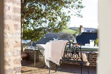 The sun soaked terrace is a lovely place to laze.
