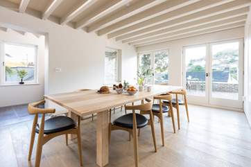 The spacious kitchen/dining-room is sure to be the place where all will gather.