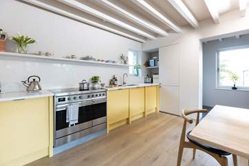 Leading off from the kitchen is the small utility-area.....