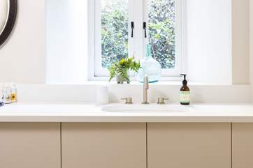 The shower-room is sleek and stylish.