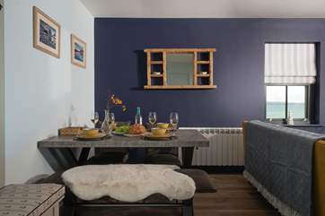 Chat about the adventures of the day around the gorgeous feature dining-table.