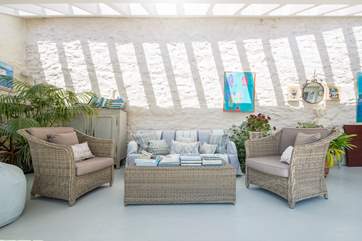 Crisp natural light floods in through the roof windows and sliding doors.