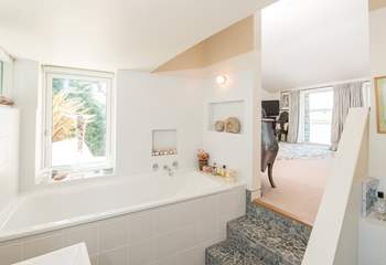 You will also find a lovely en suite bathroom down a couple of steps from bedroom one.