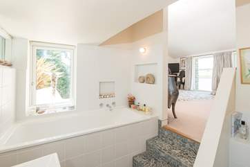 You will also find a lovely en suite bathroom down a couple of steps from bedroom one.