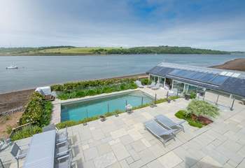 Beach House sits in a spectacular location on the banks of the Cleddau  River