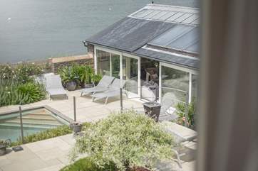 The fantastic sun-room offers another soothing place to relax.