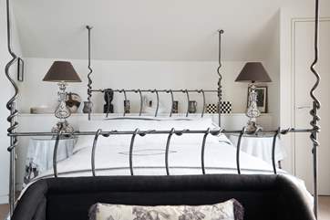 Bedroom one is home to a luxurious king-size bed.