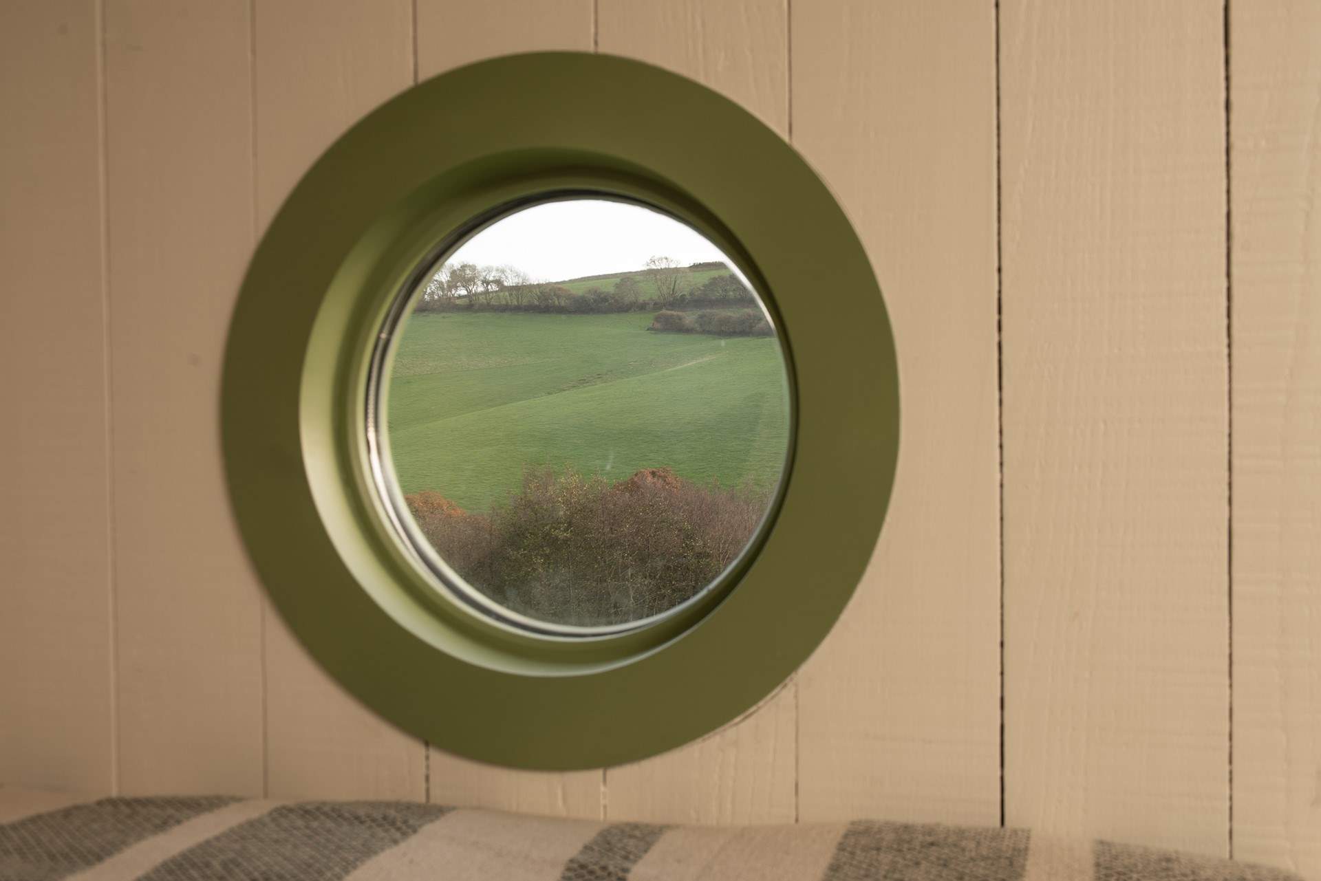 Enjoy a slow morning admiring the spellbinding view from the cosy double bed.