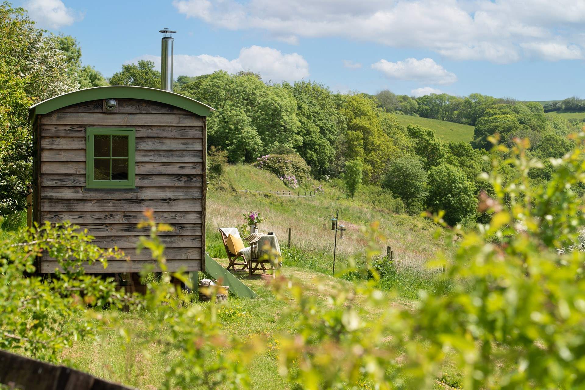 Peaceful woodland and rolling countryside hills encompass this heavenly haven.