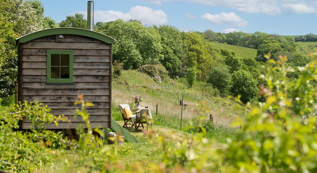 Peaceful woodland and rolling countryside hills encompass this heavenly haven.