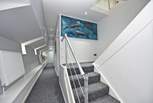 Stairs lead to the lower deck and bedrooms 2, 3 and 4. 