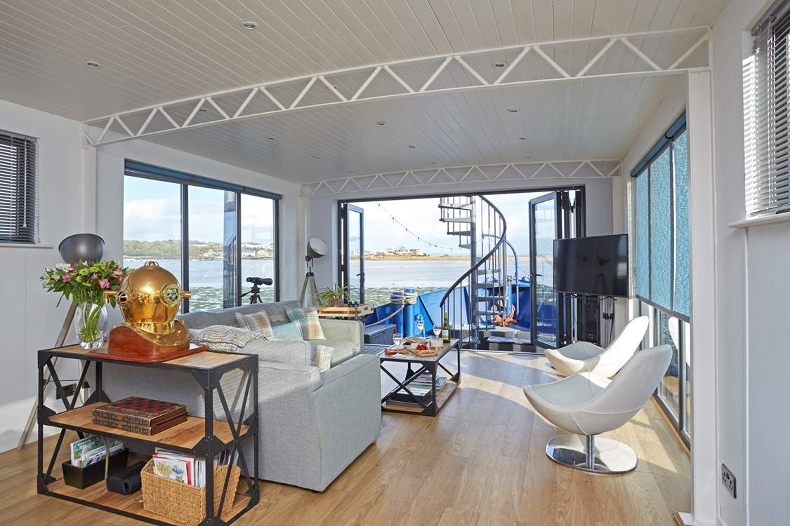 Relax and enjoy the sea views from the bi-fold doors.