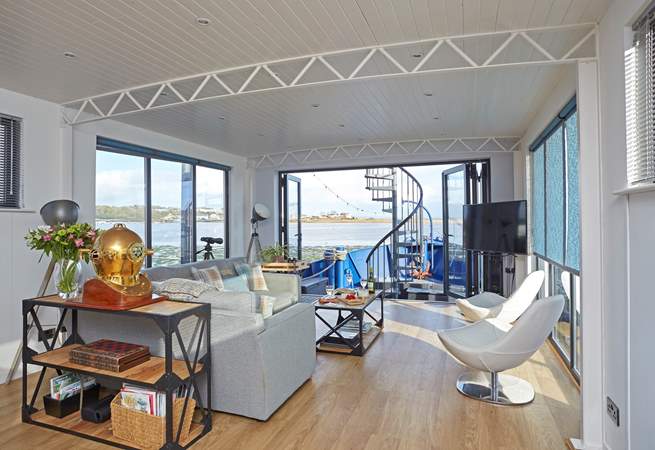 Relax and enjoy the sea views from the bi-fold doors.