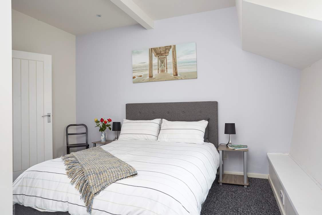 Inviting bedroom 2 with en suite shower-room is on the lower deck.
