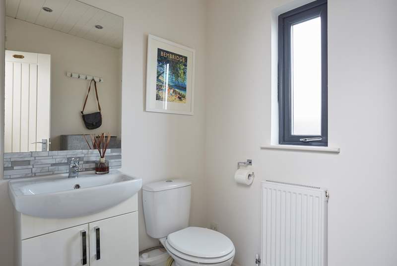 A handy cloakroom is located off the entrance hall.