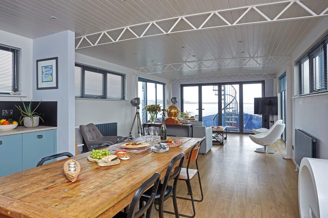 The super sociable open plan living space is beautifully designed.