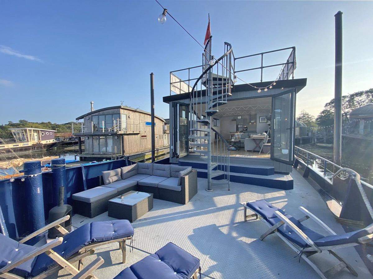 Plenty of outdoor seating is on the main deck (please note, the sunloungers have now been replaced with deck chairs). The spiral staircase leads to the upper deck which boasts fantastic views.