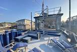 Plenty of outdoor seating is on the main deck (please note, the sunloungers have now been replaced with deck chairs). The spiral staircase leads to the upper deck which boasts fantastic views.