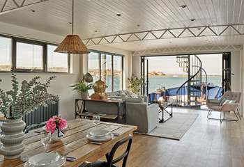 The sociable open plan living space is beautifully designed. (Please note that the doors are now operational from the left-hand side only). 