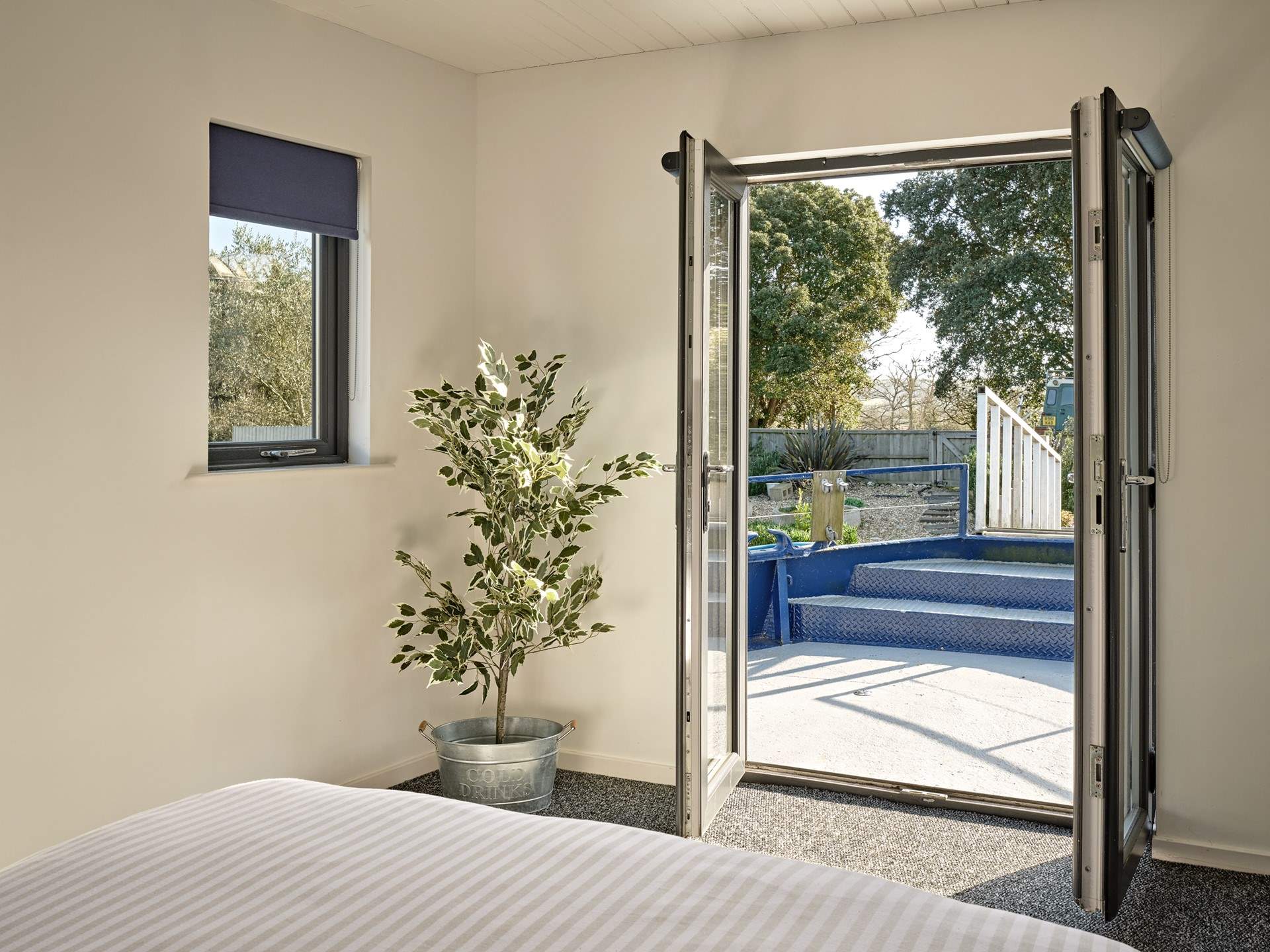 Open the doors and let the natural light streams through.