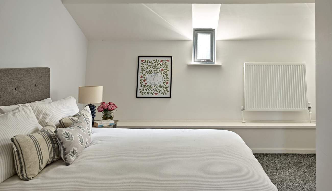 Inviting bedroom 2 with en-suite shower-room is on the lower deck.