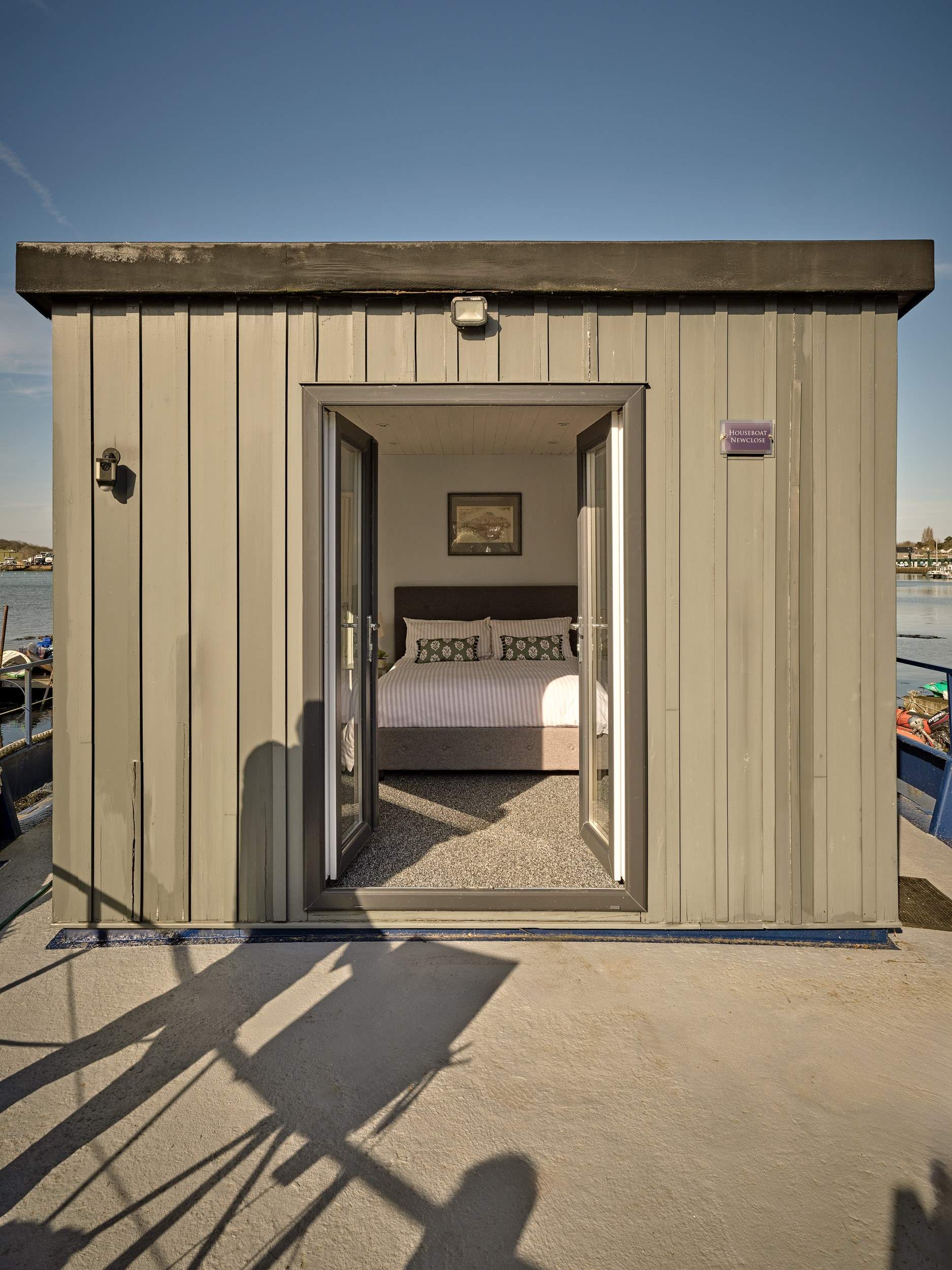 Bedroom 1 on the main deck benefits from patio doors leading to the outer deck as well as an en-suite.