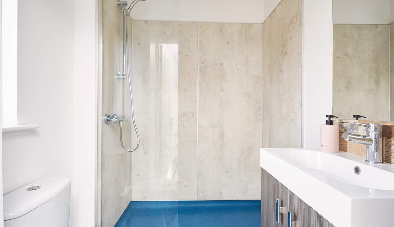 The en suite shower-room to bedroom 1, perfect for freshening up after a day of adventures. 