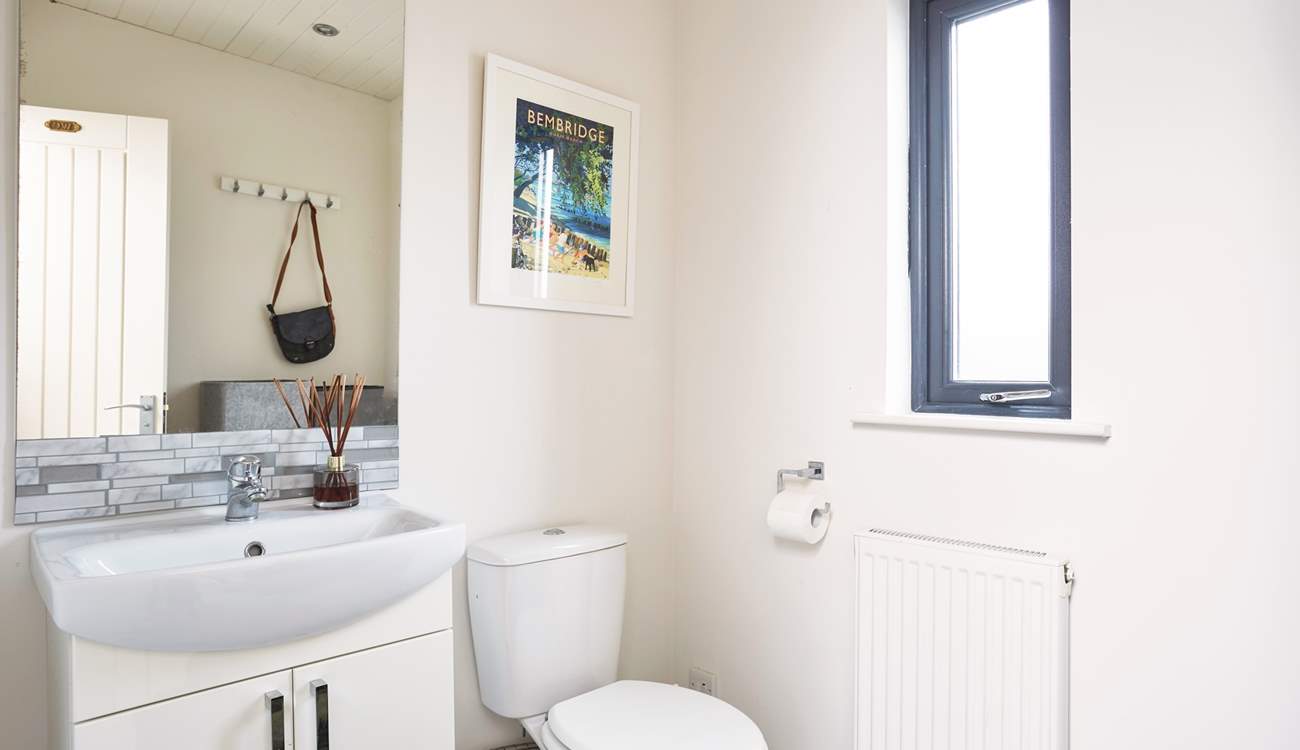 A handy cloakroom is located off the entrance hall.
