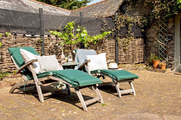 The steamer chairs invite you lie back and relax