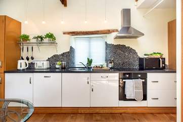 The stylish kitchen is well equipped