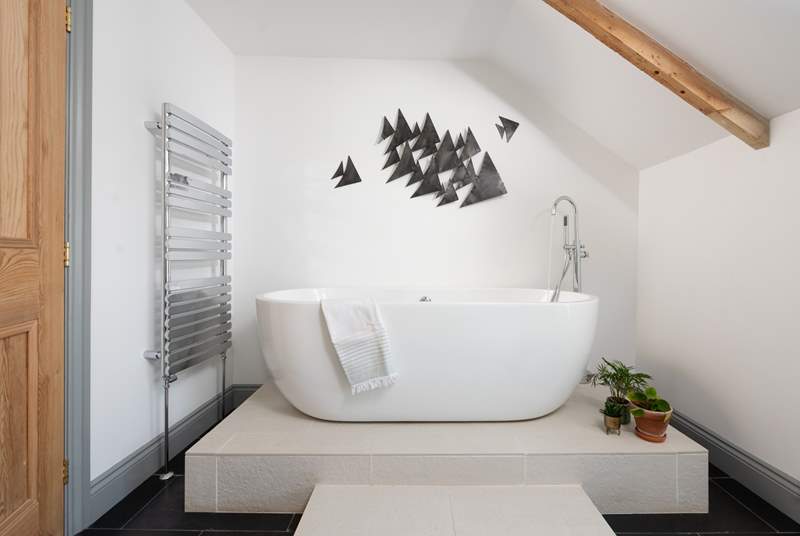 The double ended bath takes pride of place in the family bathroom...