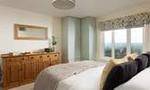 Not wanting to miss out - bedroom 4 enjoys the fabulous view as well. - Thumbnail Image