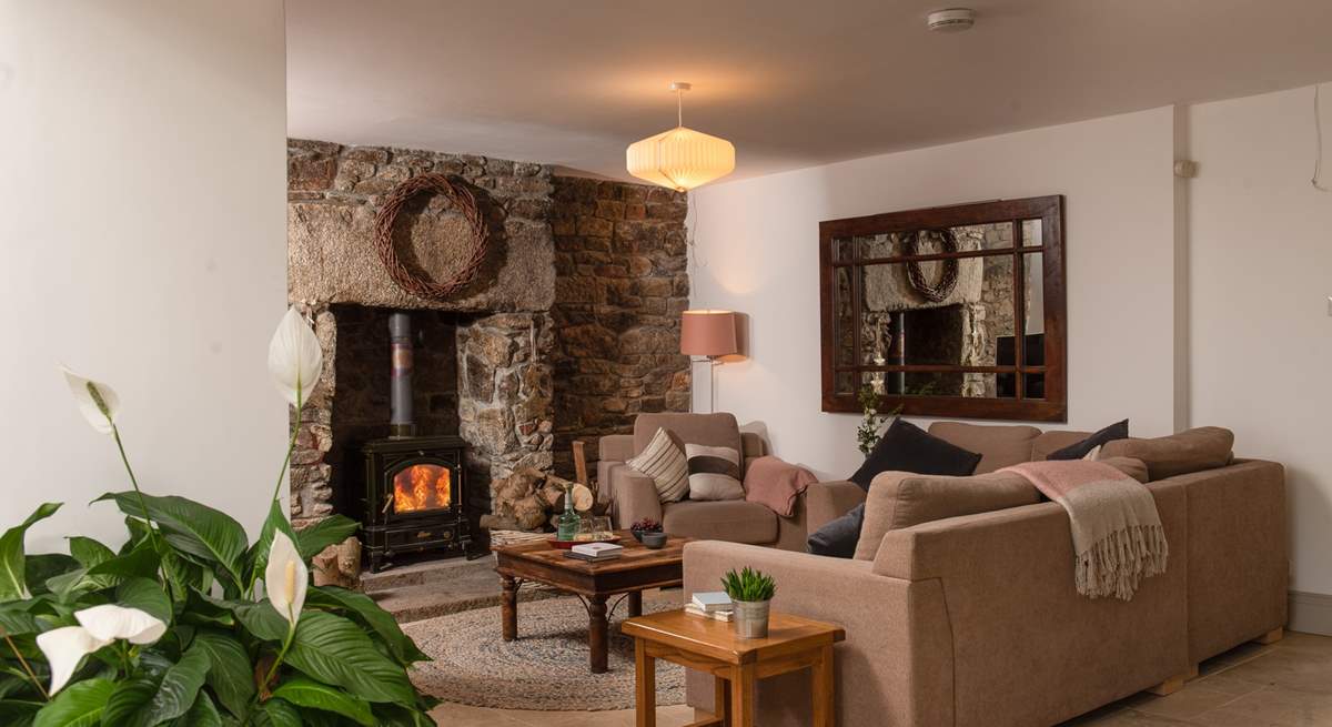 The cosy sitting-area by the toasty wood-burner.