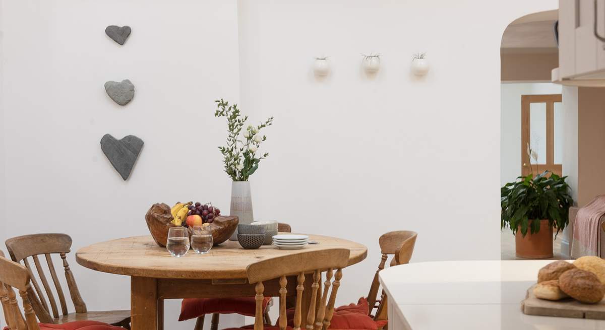 The kitchen table is the ideal spot to grab a quick snack.