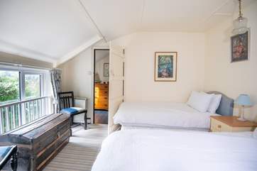 The twin bedroom is delightful.