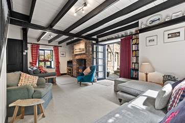 Plenty of space in the sitting-area. You'll love the Welsh art throughout the cottage.