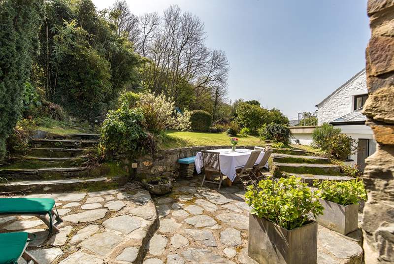 The delightful terraced gardens are perfect for al fresco dining.