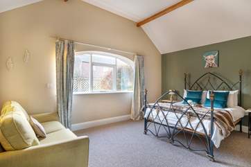 Beautiful Bedroom 1 with a comfy sofa bed.